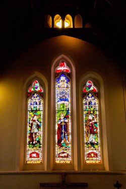I think this might the window in the north transept: ' ... a few months later [in 1913] the trustees of the late Mr. John Thomas put in a glass window in the north transept.' The Western Mail, Friday 27 May 1914, p. 34.