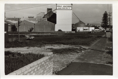 Between no. 114 and Craig Street